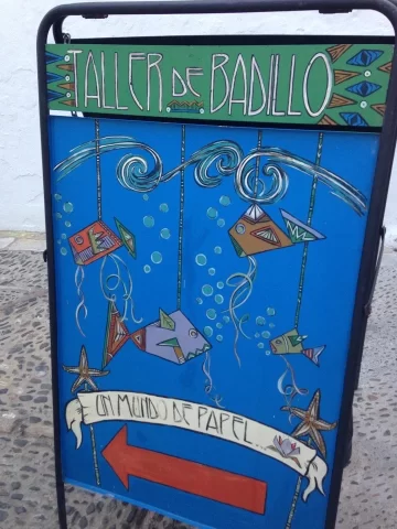 taller cartel de la tienda